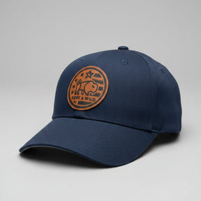 Navy blue cap with a brown logo on a light gray background